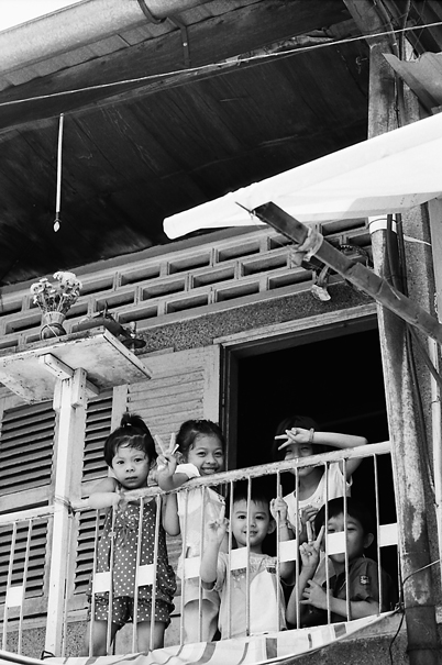 Peace Signs On The Veranda (Vietnam)