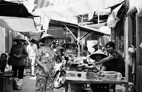 Smiles In The Street Market (Vietnam)