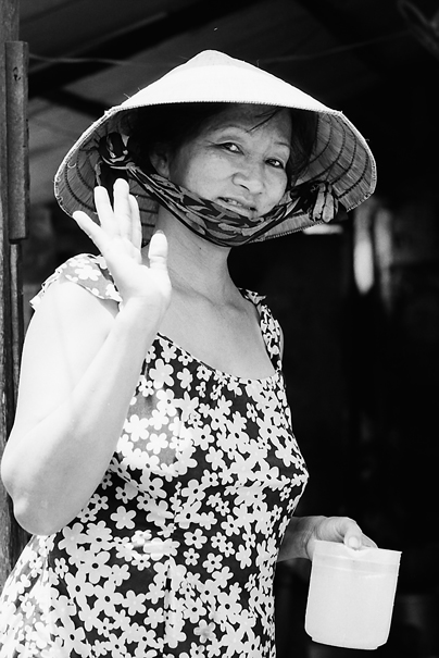 Woman replying with hand in air