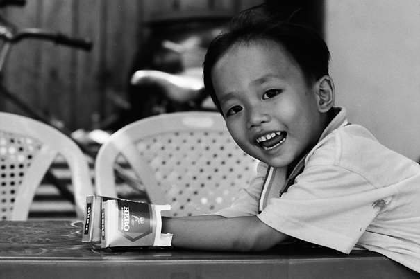 Boy And Boxes Of Instant Coffee (Vietnam)