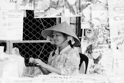 Young woman working in kiosk