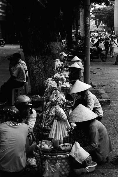 Conical Hats On The Sidewalk (Vietnam)