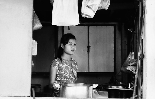 Young woman working in eating place