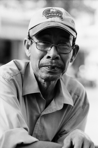 Elderly man wearing cap