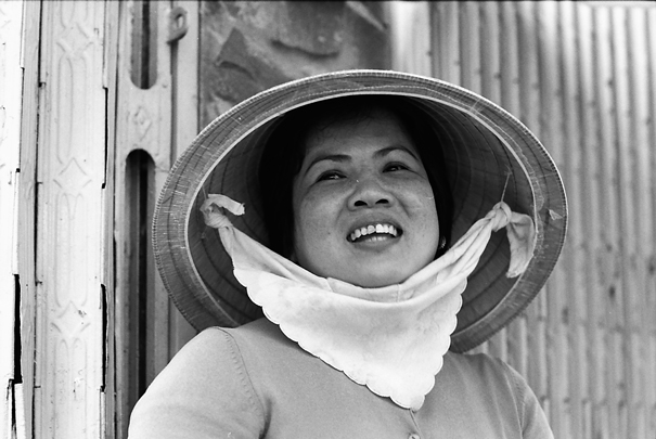 Woman Wearing A Conical Hat In The Market (Vietnam)