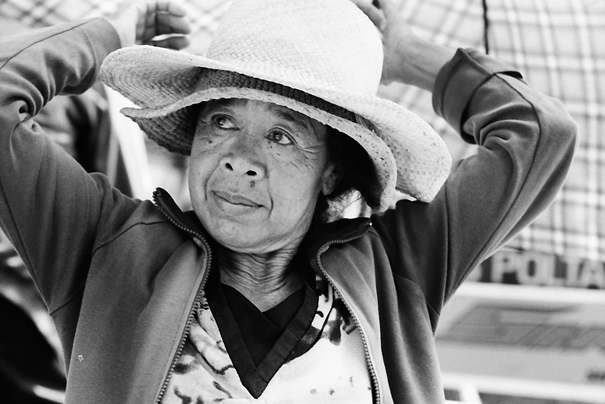Woman With Two Hats (Indonesia)