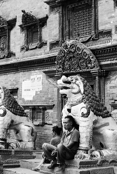 Man Leaning Against A Lion (Nepal)