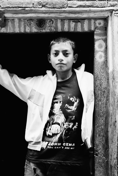 Youngster At The Door (Nepal)