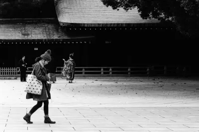 Girl heading for prayer hall in Meiji Jingu
