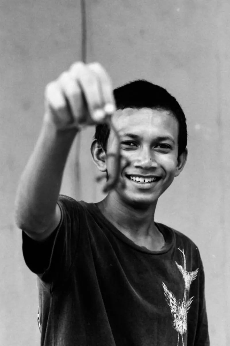 Boy showing lizard