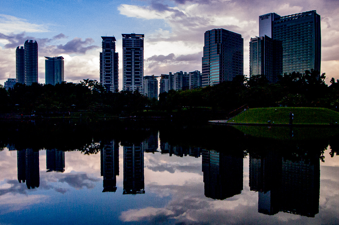 Buildings being reflected in pond
