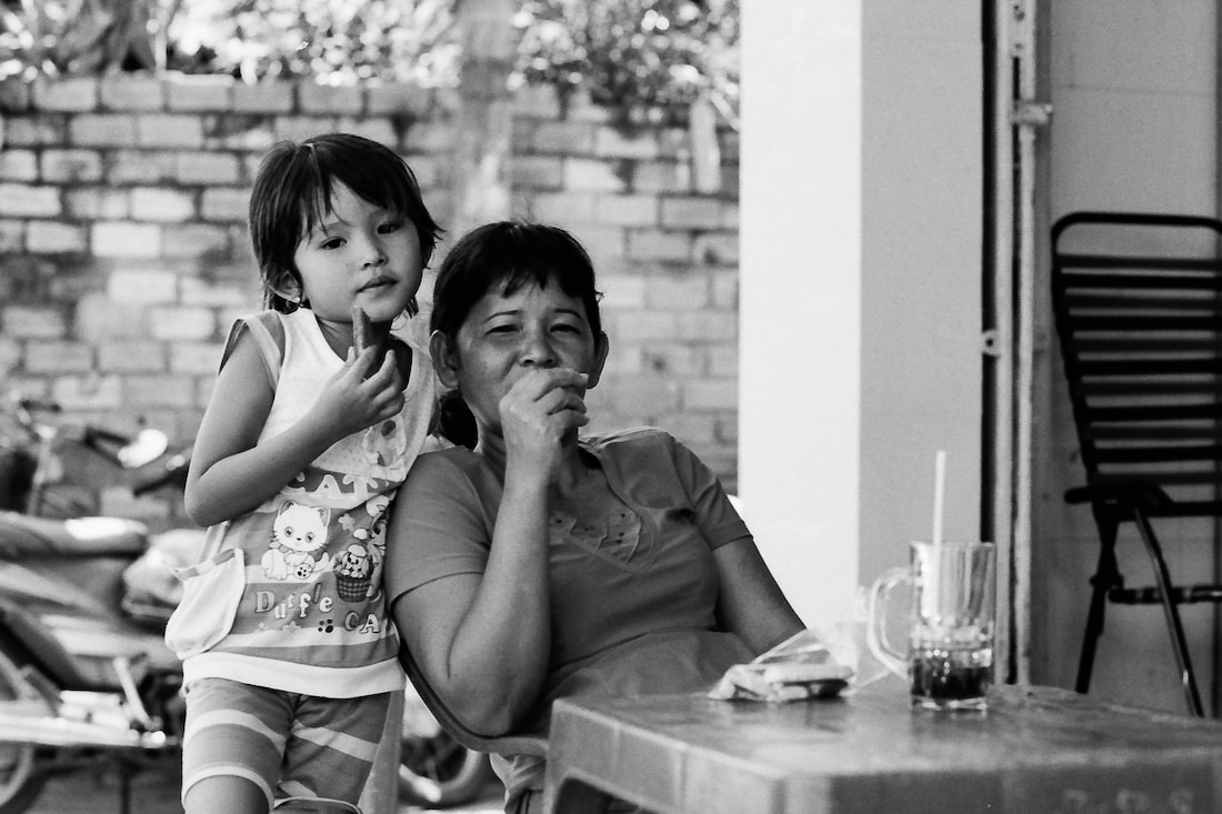 Mother and daughter in cafe