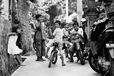 Children playing together in lane