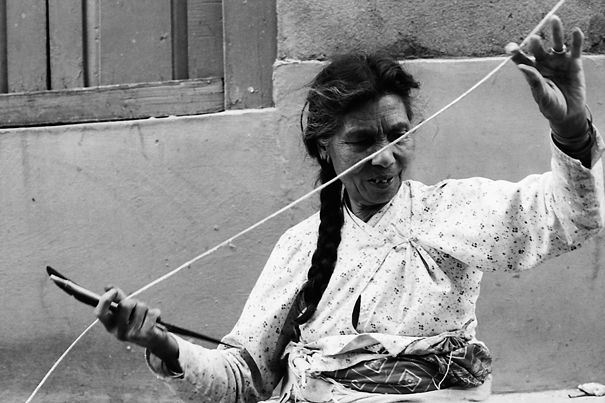 Working Woman And A Thick String (Nepal)