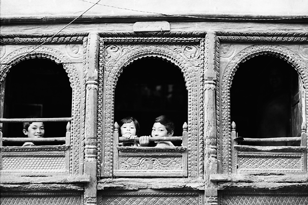 Kids sitting by window