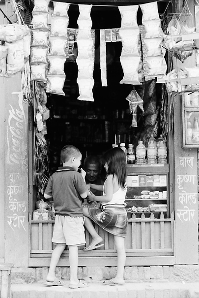 Boy and girl in candy store