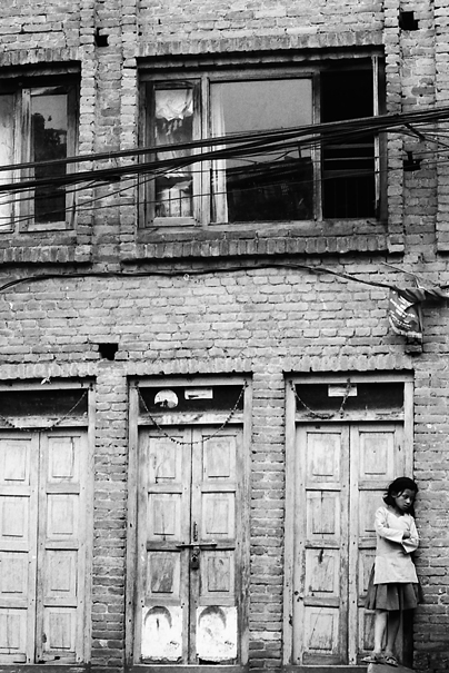 Girl Leaning Against The Wall (Nepal)