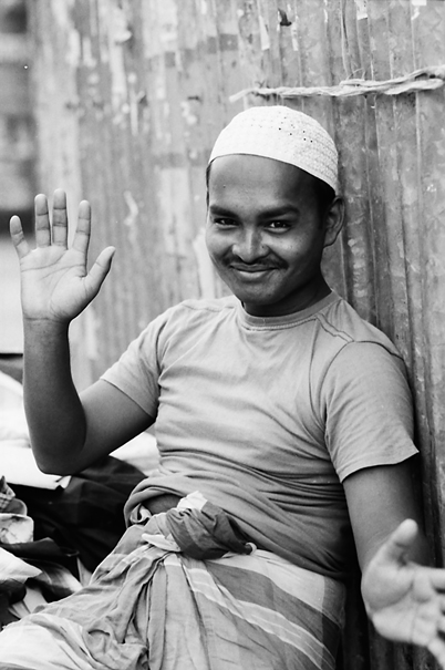 Smiling Man Wearing A White Cap (Bangladesh)