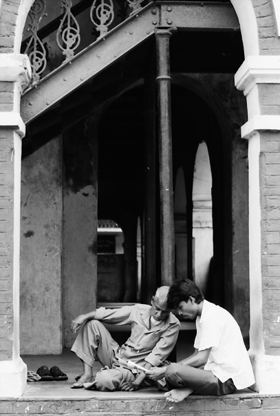 Two Men At The Entrance Of A Mosque (Bangladesh)