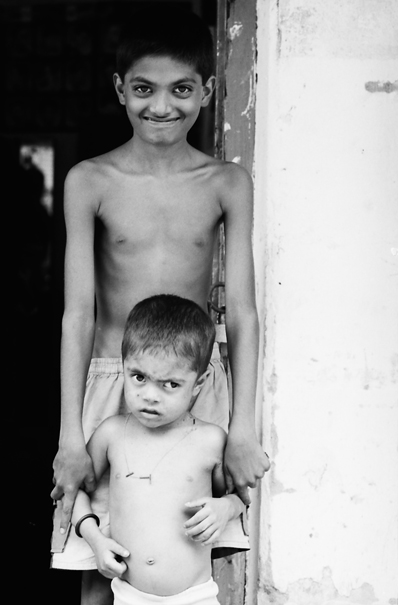 Brothers standing at entrance