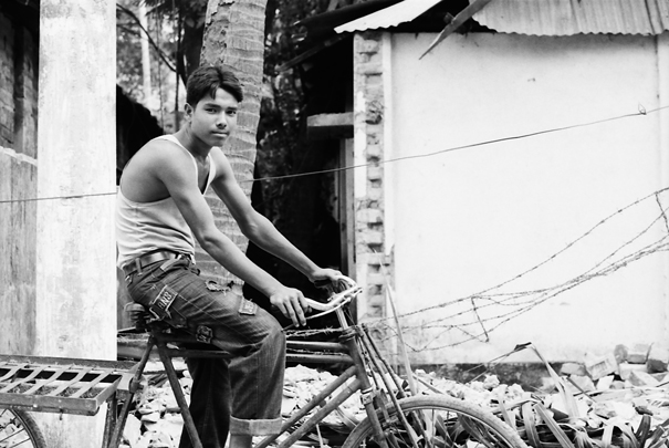 Young man on tricycle