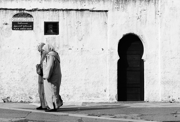 Walking Women And Keyhole-like Entrance (Morocco)