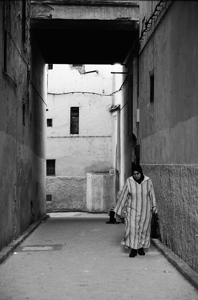 Woman Wearing Jellaba In The Lane (Morocco)