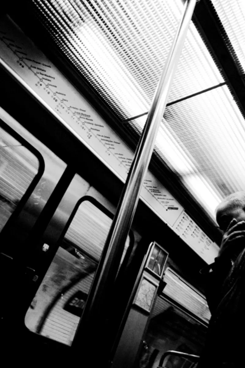 Man covering face with hand