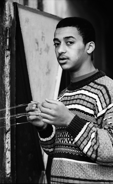 Man Holding Threads (Morocco)