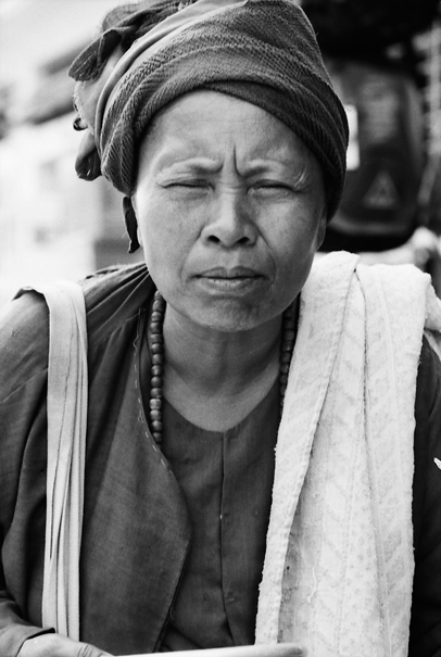 Squinching Woman Asked For Alms (Myanmar)