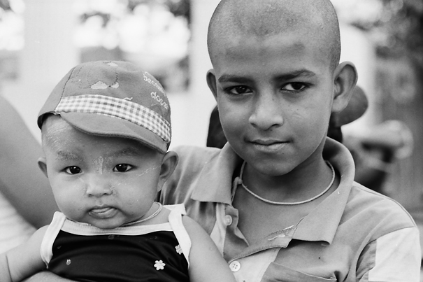 Baby In A Hat And Prick-eared Brother (Myanmar)