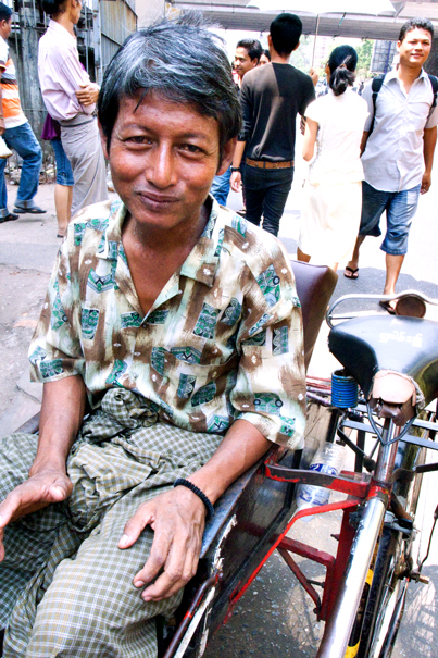 Pedicab Driver Wearing A Longyi (Myanmar)