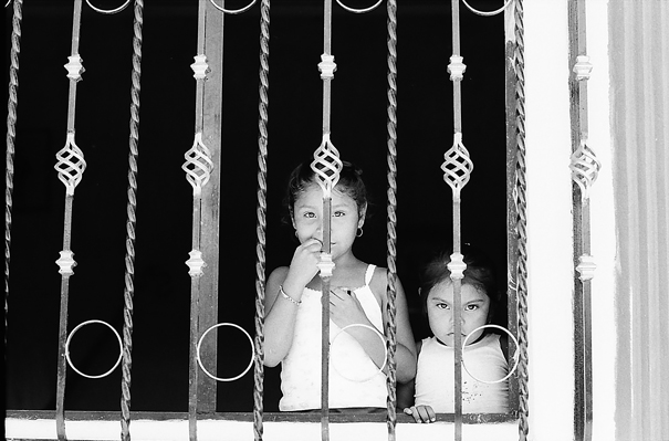 Sisters by window