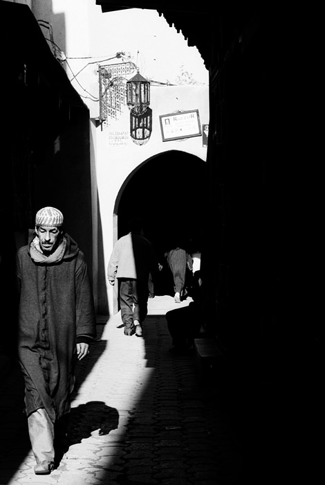 Man walking in sunny spot
