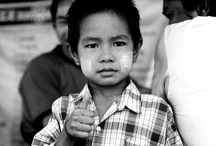 Boy thumbing up