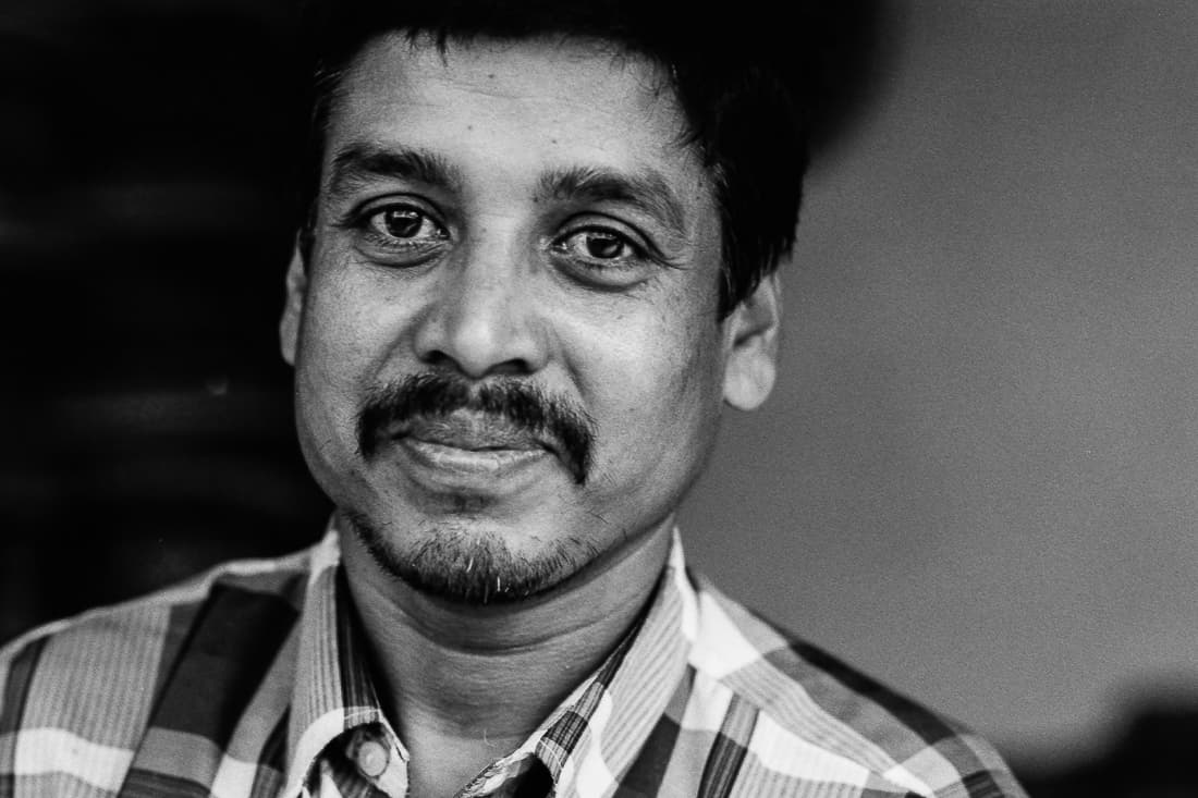 Man wearing checkered shirt