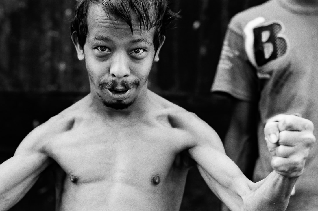 Man striking pose strongly