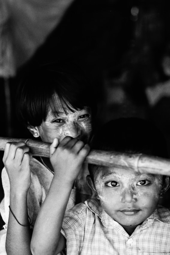 Boy and girl poring