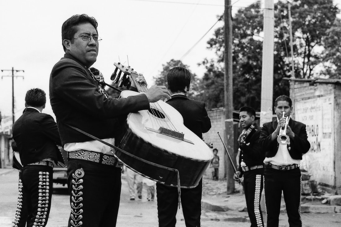 Mariachi playing in street