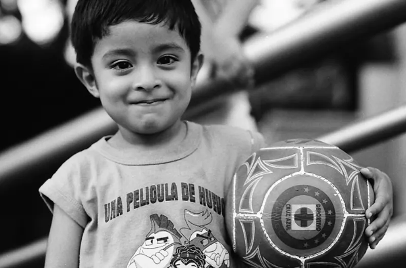 Boy holding football