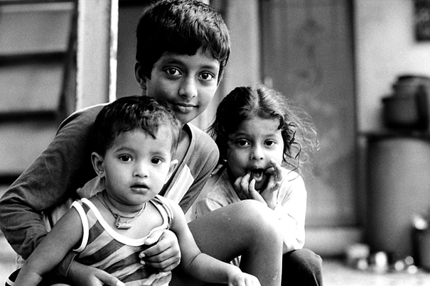 Three Kids Sitting Together (India)