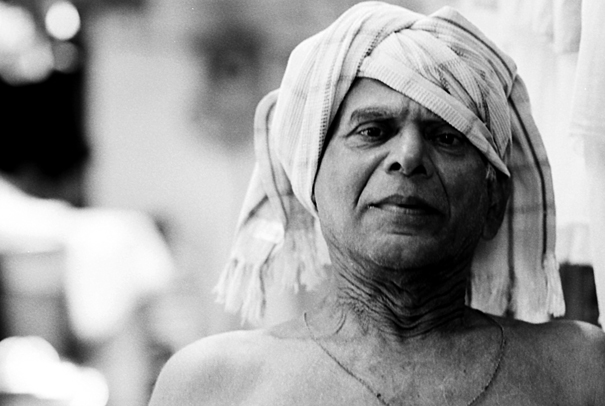 Man Tieing A Wrap Around His Head (India)