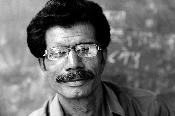 Man Wearing Glasses In A Barber (India)