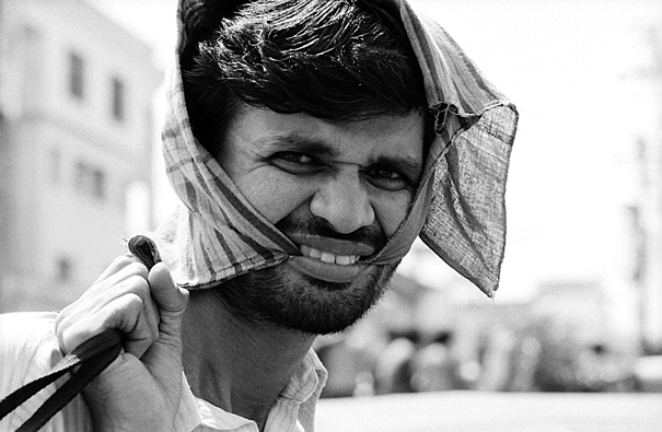 Man putting towel on head
