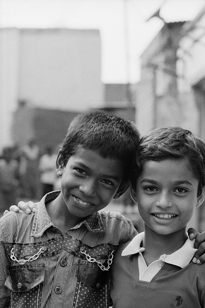 Two Smiling Boys Standing Together (India)