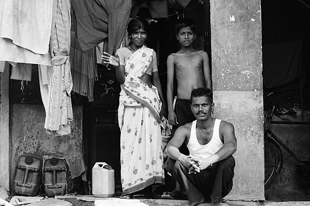 Family In Front Of Their House (India)