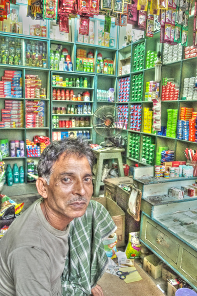 Man Sitting In The General Store (India)