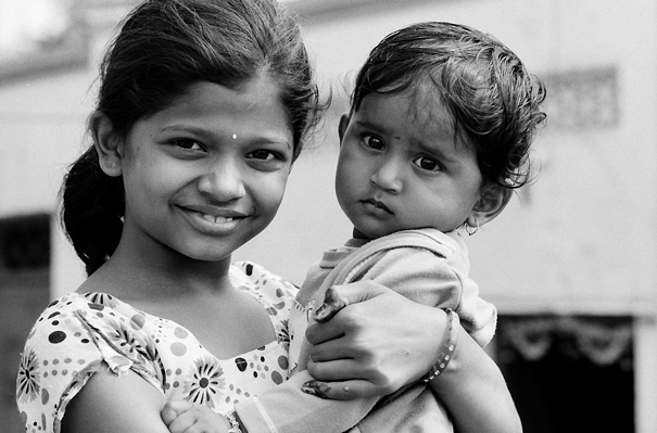 Young Mother And Her Confused Baby (India)