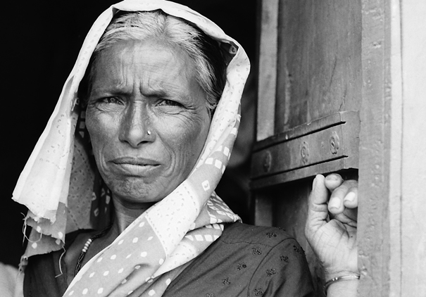 Woman Putting A Scarf On Her Head (India)