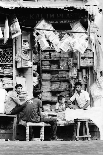 Men Relaxing In A Shop (India)